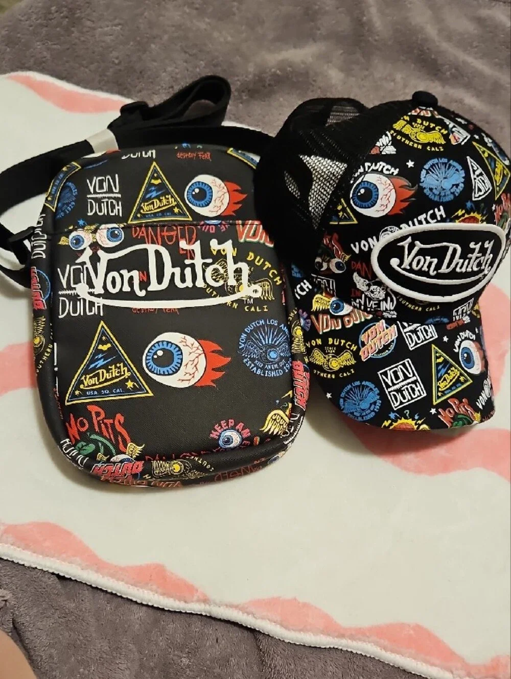 Von Dutch Black Crossbody Bag with Colorful Graphic Accents 2 Piece Bag And Hat